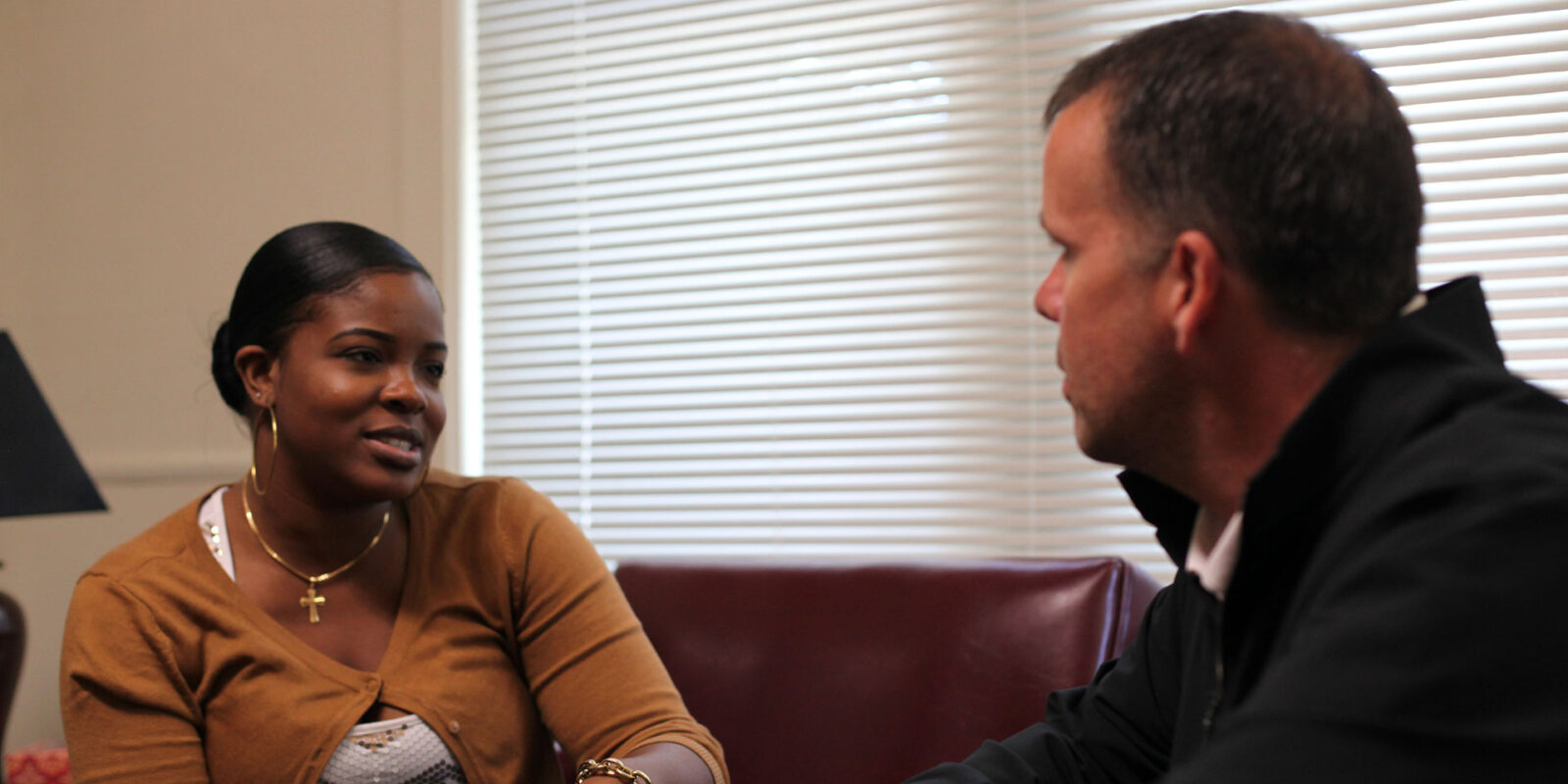 social worker on couch with client